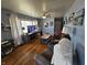 Bright and airy living room with hardwood floors, comfortable seating, and a modern media center at 2113 Silver St, Anderson, IN 46012