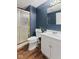 Bathroom features vanity, toilet, and a shower with gold trim at 2323 Chaucer Dr, Columbus, IN 47201