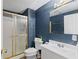 Bathroom features a vanity, toilet, and shower with gold trim at 2323 Chaucer Dr, Columbus, IN 47201