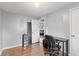 Bedroom showcasing a functional desk, ample storage and an open doorway to another room at 2323 Chaucer Dr, Columbus, IN 47201