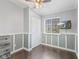 Cozy bedroom with wainscoting and a ceiling fan at 2323 Chaucer Dr, Columbus, IN 47201