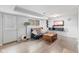 Finished basement featuring a comfortable seating area and laminate flooring at 2323 Chaucer Dr, Columbus, IN 47201
