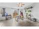 Bright living room with wood floors, large windows, and plenty of room for entertaining at 2323 Chaucer Dr, Columbus, IN 47201