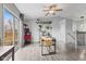 Bright living room with wood floors, large windows, and plenty of room for entertaining at 2323 Chaucer Dr, Columbus, IN 47201
