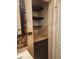 Bathroom featuring tiled walls, cabinet and storage shelves at 2441 Northview Ave, Indianapolis, IN 46220