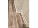 Close-up of modern flooring complemented by a white wall with decorative base trim at 2441 Northview Ave, Indianapolis, IN 46220
