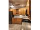 Kitchen with stainless steel appliances, ample storage and modern countertop at 2441 Northview Ave, Indianapolis, IN 46220