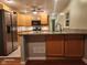 Kitchen featuring stainless steel appliances, granite countertop and eat-in layout at 2441 Northview Ave, Indianapolis, IN 46220