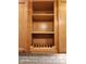 Spacious kitchen cabinet design featuring light wood and open shelving with plate holder at 2441 Northview Ave, Indianapolis, IN 46220