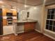 Eat-in kitchen features wood cabinets, stainless steel appliances, and granite countertop at 2441 Northview Ave, Indianapolis, IN 46220