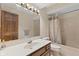 Bathroom with tile flooring, sink, and shower-tub combo at 252 N Raceway Rd, Indianapolis, IN 46234