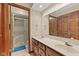 Bathroom with double sink vanity, and walk-in shower at 252 N Raceway Rd, Indianapolis, IN 46234