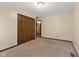 Bedroom with closet and carpeted floors at 252 N Raceway Rd, Indianapolis, IN 46234