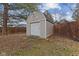 Shed with small front porch and gray and white finish at 252 N Raceway Rd, Indianapolis, IN 46234