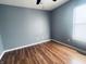 Bedroom with hardwood floors, a ceiling fan and gray painted walls at 254 Halldale Dr, Whiteland, IN 46184