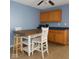 Cozy dining space with a table, chairs, and built-in cabinets at 254 Halldale Dr, Whiteland, IN 46184