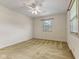 Bedroom with a ceiling fan and neutral carpeting at 2818 S Irwin St, Indianapolis, IN 46203