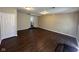 Finished basement featuring dark wood floors, neutral paint, and recessed lighting at 3060 S Lyons Ave, Indianapolis, IN 46241