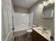 Clean bathroom showcasing a vanity, a toilet, and a tub-shower combination at 320 Lakewood Ct, Avon, IN 46123