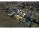 Aerial view of a residential neighborhood with well-maintained homes and green lawns at 3932 Villa Dr, Columbus, IN 47203