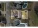An aerial shot of a home with a backyard, neighboring houses, and community with a pool at 3932 Villa Dr, Columbus, IN 47203