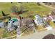 Aerial view of a residential neighborhood with homes with mature trees and green lawns at 3932 Villa Dr, Columbus, IN 47203