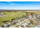 Charming neighborhood aerial view with tree-lined streets near a large park on a sunny day at 3932 Villa Dr, Columbus, IN 47203