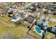 Aerial view of a residential neighborhood with well-maintained homes and lush green lawns at 3932 Villa Dr, Columbus, IN 47203
