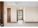 Neutral entryway with light tile flooring and a view to the outside at 3932 Villa Dr, Columbus, IN 47203