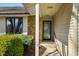 Inviting entryway of a home with stone accents and manicured landscaping at 3932 Villa Dr, Columbus, IN 47203