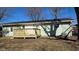 Backyard exterior featuring a wooden deck on a sunny day at 4713 Calhoun St, Indianapolis, IN 46203