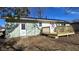 Exterior backyard view with a wooden deck at 4713 Calhoun St, Indianapolis, IN 46203