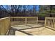 New wooden deck boasts light wood railings and posts, and a level walking surface at 4713 Calhoun St, Indianapolis, IN 46203