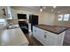 Modern kitchen with sleek countertops, white cabinets, and an island at 4713 Calhoun St, Indianapolis, IN 46203