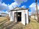 The shed offers additional storage space, perfect for outdoor equipment and tools, with an open door at 505 Birch St, Beech Grove, IN 46107