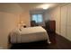 Comfortable bedroom with hardwood floors, ample natural light, and ample storage space at 5533 Wilson Way, Jamestown, IN 46147