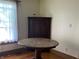 Eat-in kitchen with wood floors, a decorative corner cabinet, and a bright window at 5533 Wilson Way, Jamestown, IN 46147