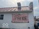 On the Rise Bakehouse LLC sign on a white building exterior at 5533 Wilson Way, Jamestown, IN 46147