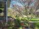 Close up view of exterior home details with beautiful landscaping and garden in full bloom at 5533 Wilson Way, Jamestown, IN 46147