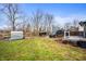 Spacious backyard showing the potential for parking at 6440 Watercrest Way, Indianapolis, IN 46278