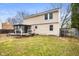 Back exterior of home with spacious yard and deck at 6440 Watercrest Way, Indianapolis, IN 46278