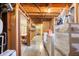 Unfinished basement with laundry area including washer and dryer hookups at 6440 Watercrest Way, Indianapolis, IN 46278