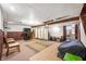 Unfinished basement with rugs and a TV offers potential for customization at 6440 Watercrest Way, Indianapolis, IN 46278