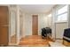 Bright bedroom space with wood-look flooring and ample natural light, offering a versatile area for relaxation or hobbies at 6440 Watercrest Way, Indianapolis, IN 46278