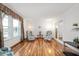 Bright living room with hardwood floors, lots of light, and comfortable seating at 6440 Watercrest Way, Indianapolis, IN 46278