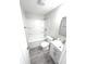Updated bathroom with a tub, shower, toilet, and modern vanity, designed for comfort and functionality at 7807 Inverness Dr, Indianapolis, IN 46237