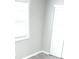 Bedroom corner featuring natural light from window and modern design at 7807 Inverness Dr, Indianapolis, IN 46237