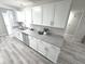 Bright kitchen features stainless steel appliances and granite countertops at 7807 Inverness Dr, Indianapolis, IN 46237