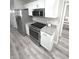 Modern kitchen features stainless steel appliances and sleek countertops at 7807 Inverness Dr, Indianapolis, IN 46237