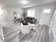 Bright living room boasts stylish furnishings and neutral tones at 7807 Inverness Dr, Indianapolis, IN 46237